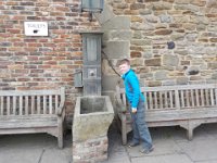 durham trip 037  Trying his hand at the water pump. : durham trip
